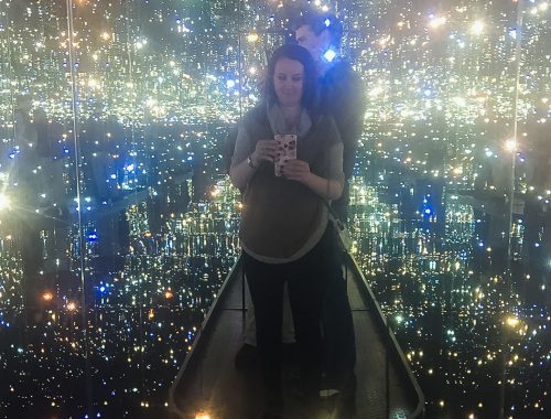 standing on the platform of tiny universes and floating orbs in yayoi kusamas infinity room